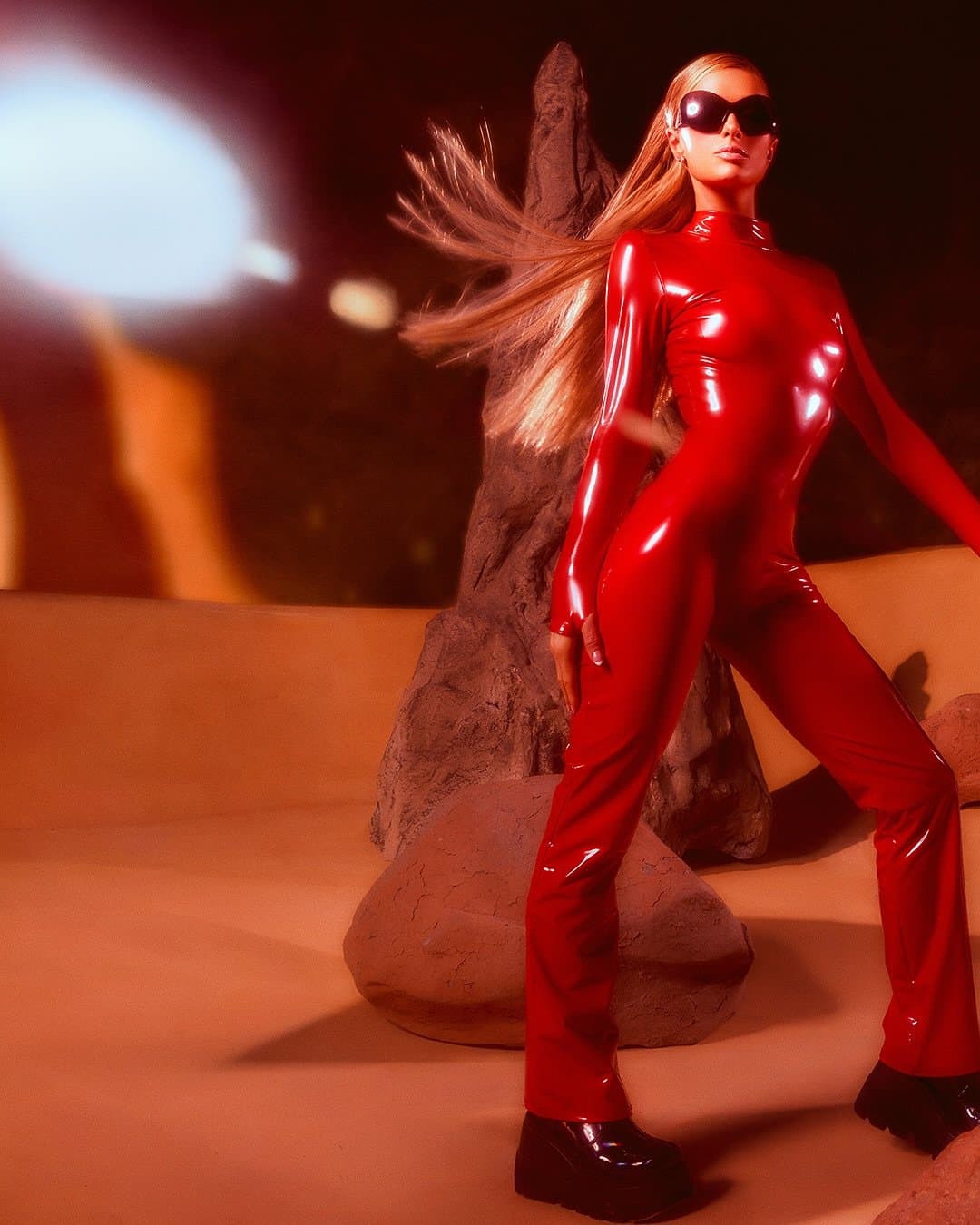 Paris in PVC catsuit