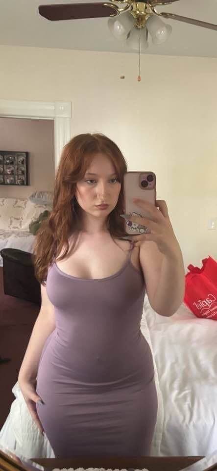 Click to view full size Slutty red head loves showing off her perfect ass