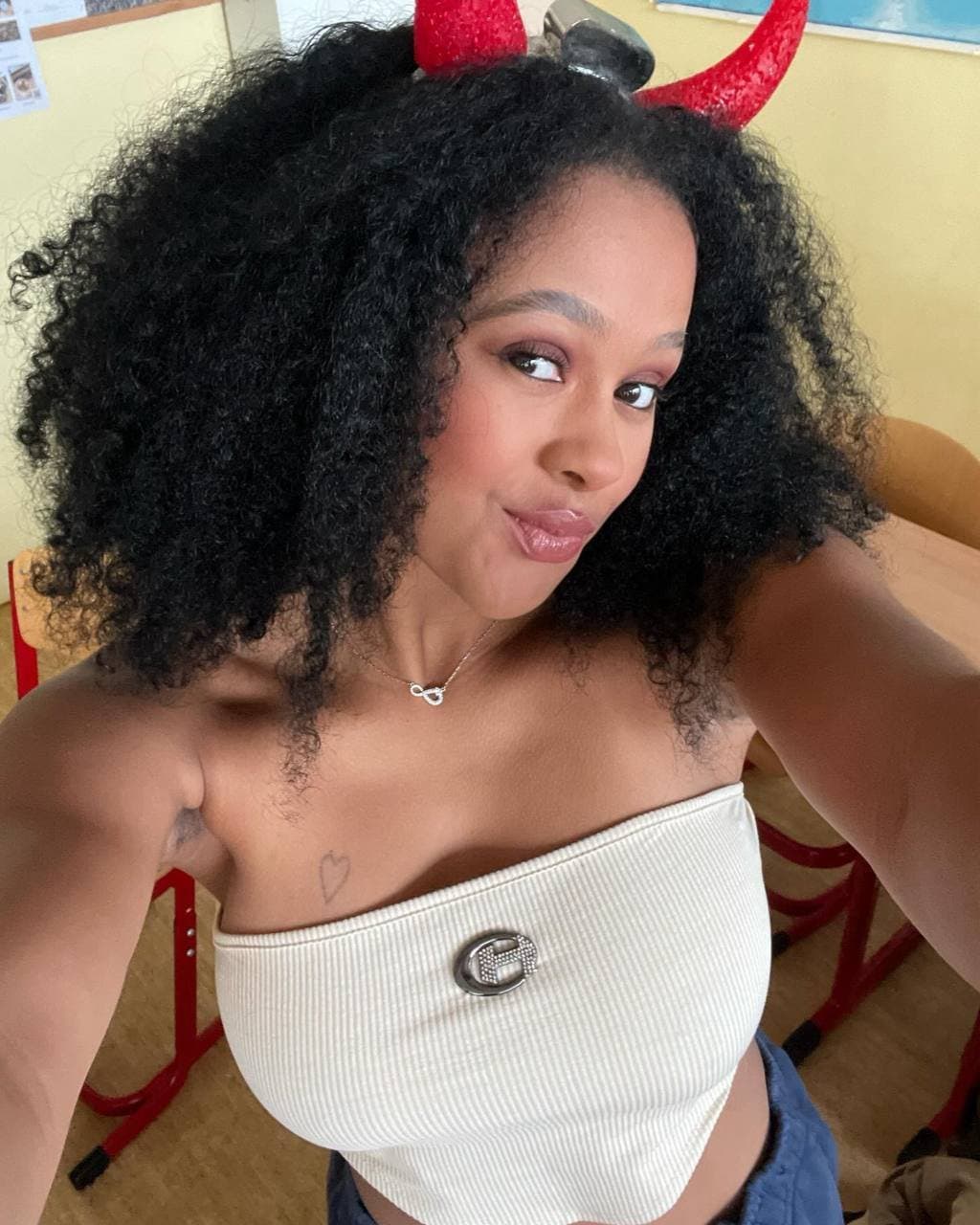 Little black slut showing it all