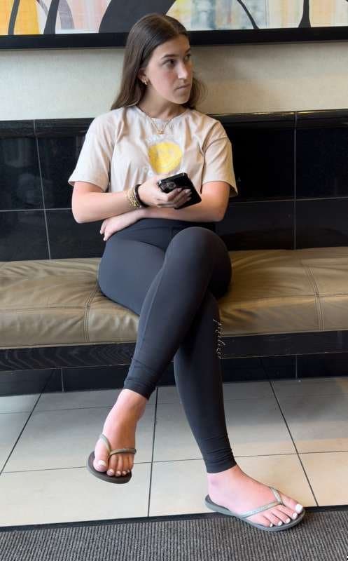 Brunette with white toes and black leggings creepshot