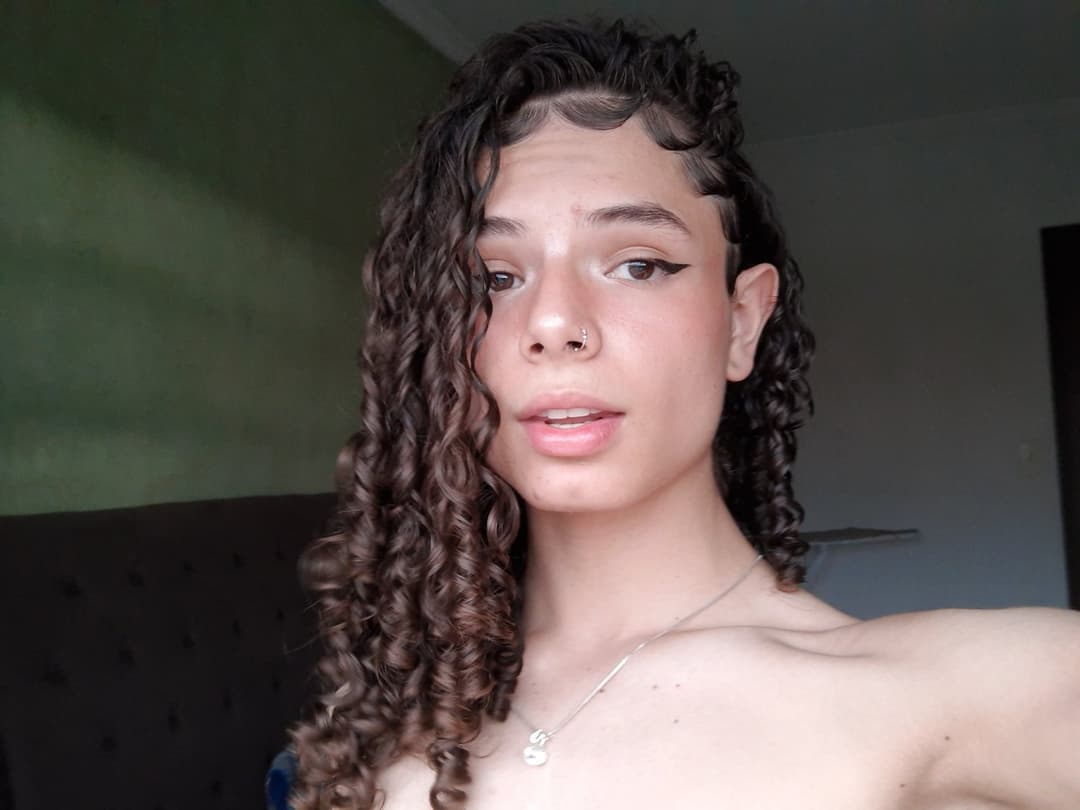 Curly latina shemale with big cock and perfect ass 3