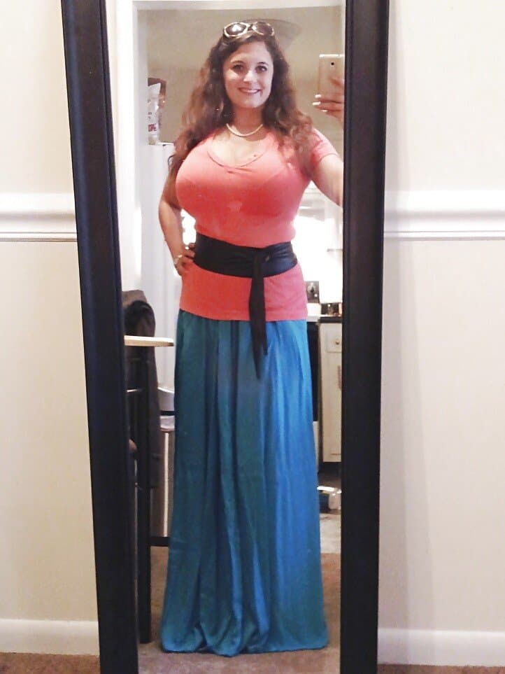 Brunette loves showing off her massive tits (non nude)