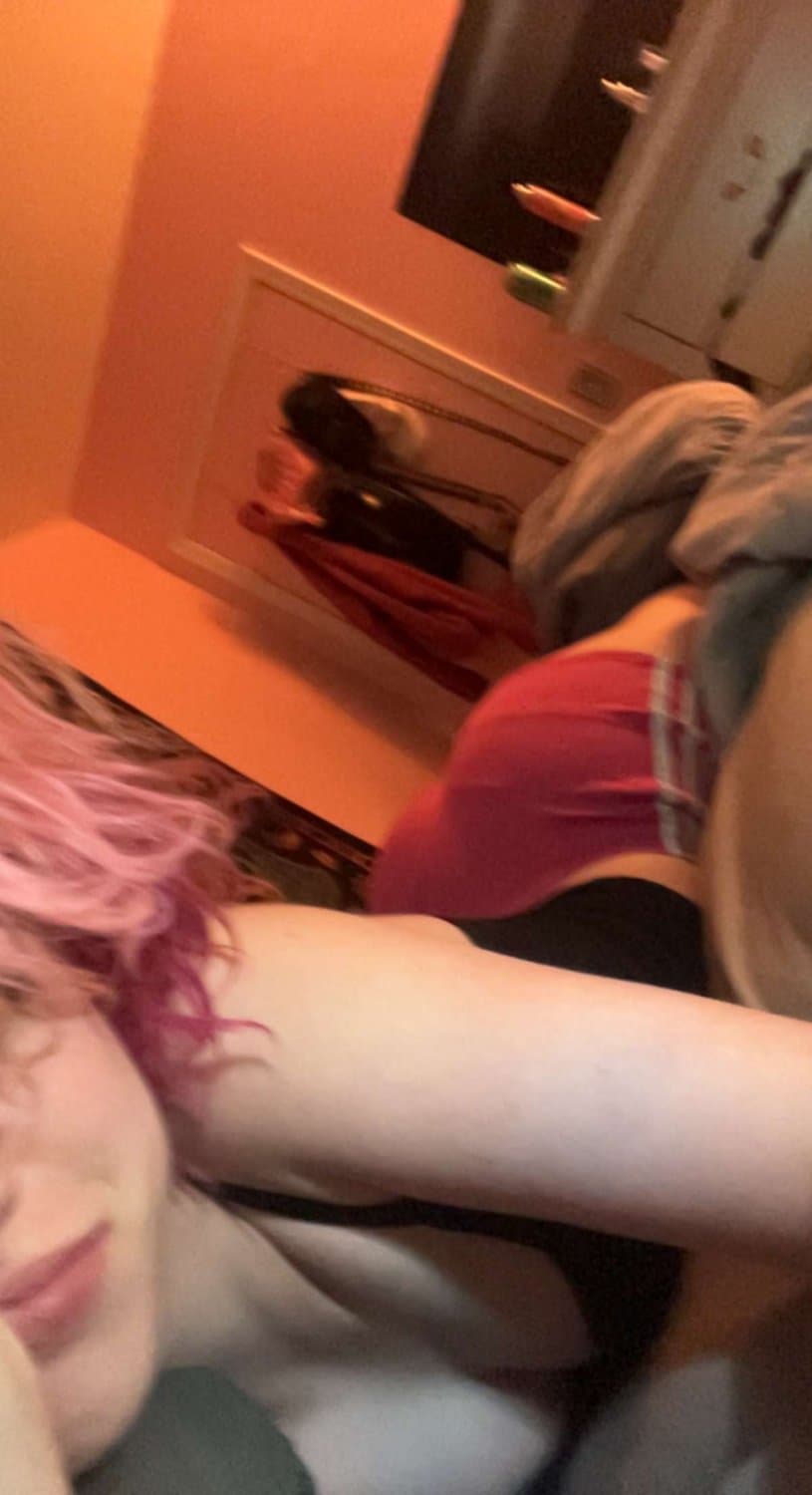 pink haired emo girl arches and shows ass
