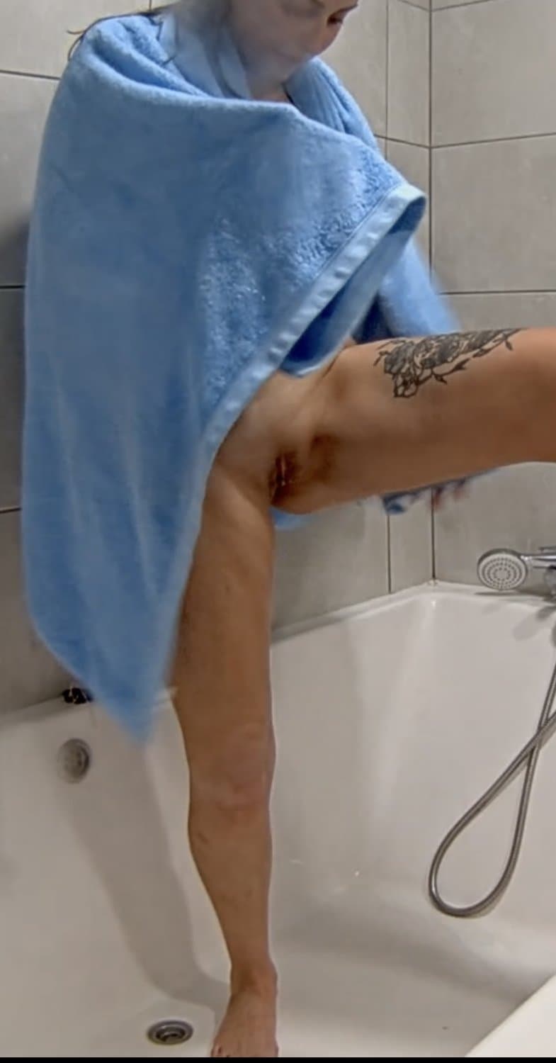 An other tatooed woman taking shower