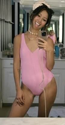 Rebecca Robertson Loflin.  The Asian in the family is a milf Christian whore working on a mom bod