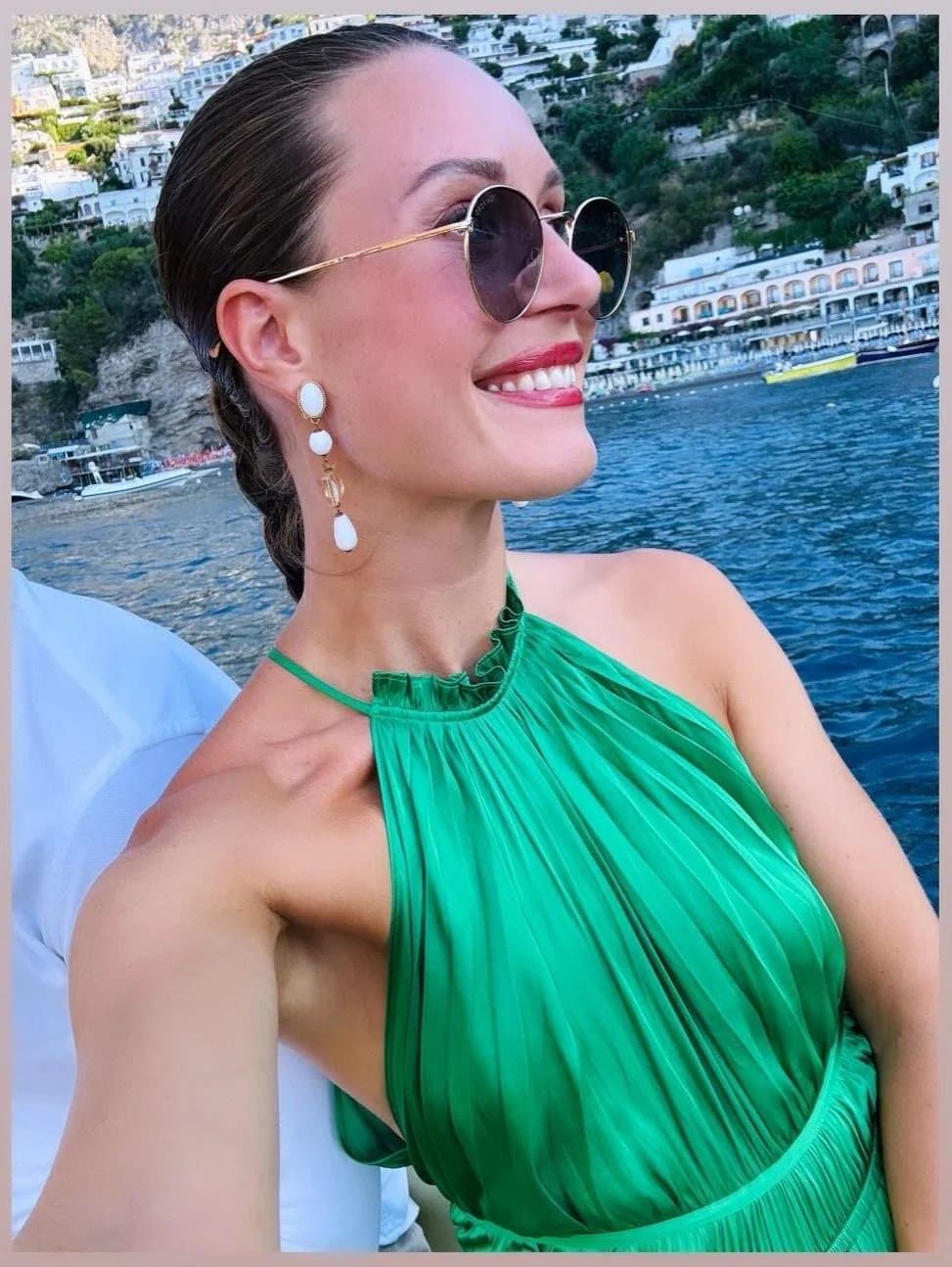 Finnish prime minister Sanna Marin.  Petite Elegant lady hinding a sex freak party chic within