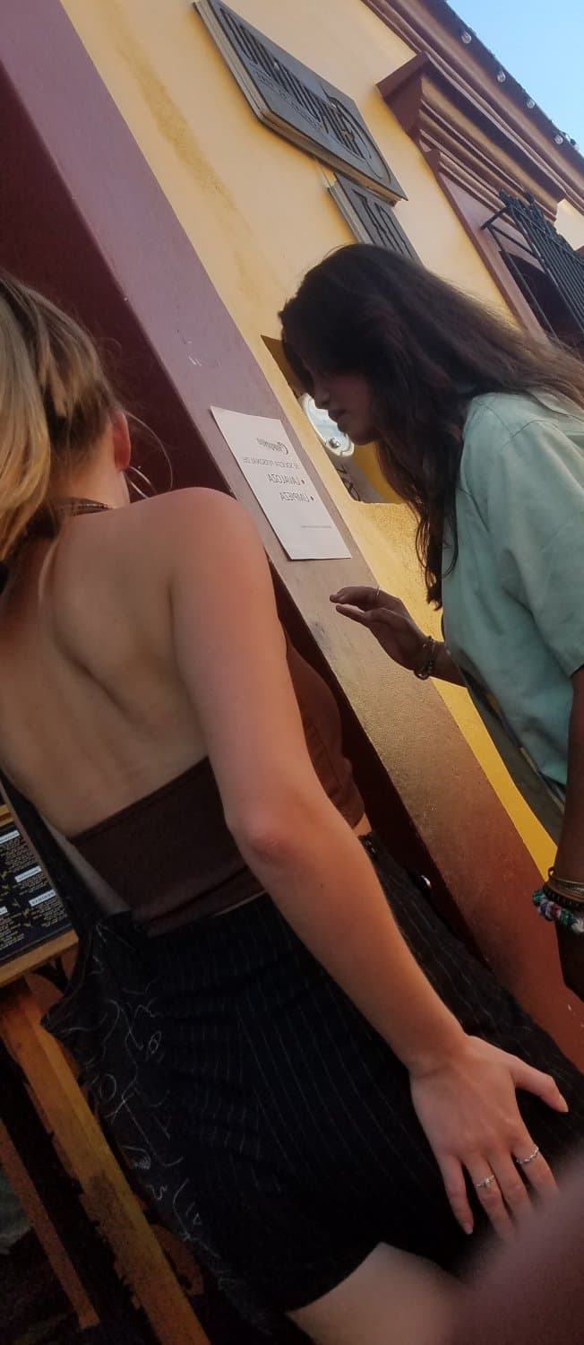 2 friends, blonde and brunette, in shorts, nice legs