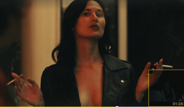 Click to view full size smoking horror hottie from horror movie A