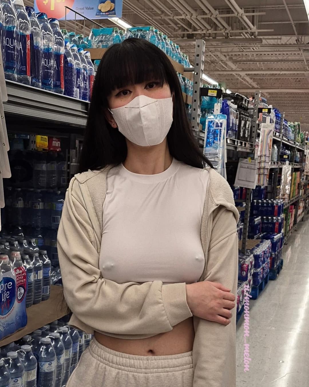 Pierced braless Asian ??