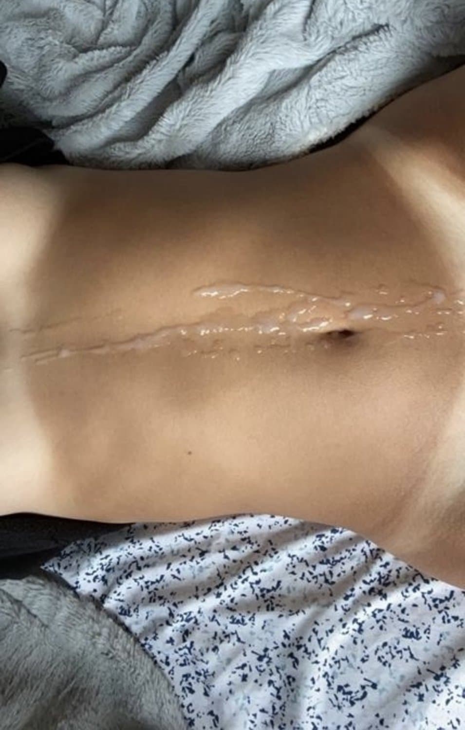 25-0403 - Her tanned skin looks good when glazed in cum ??