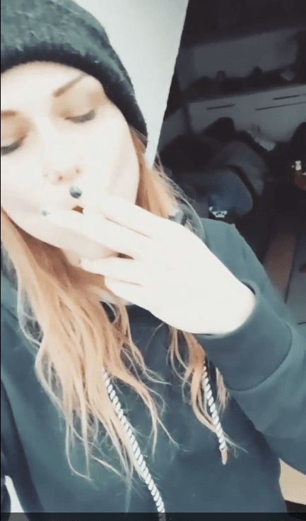 smoking hot emo hipster goth girl fucks the guys in the band. I love when women smile and smoke.