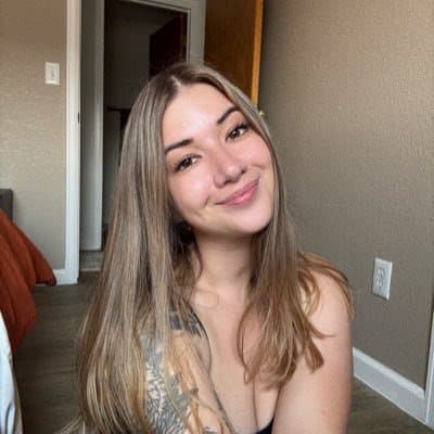 Click to view full size Hottest Milf ever? This curvy slut who loves sticking her tongue out comes damn close