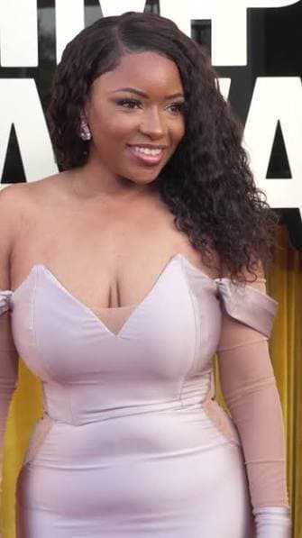 Full figured black politician Jasmine Crockett has thicc curves. Massive mommy milkers