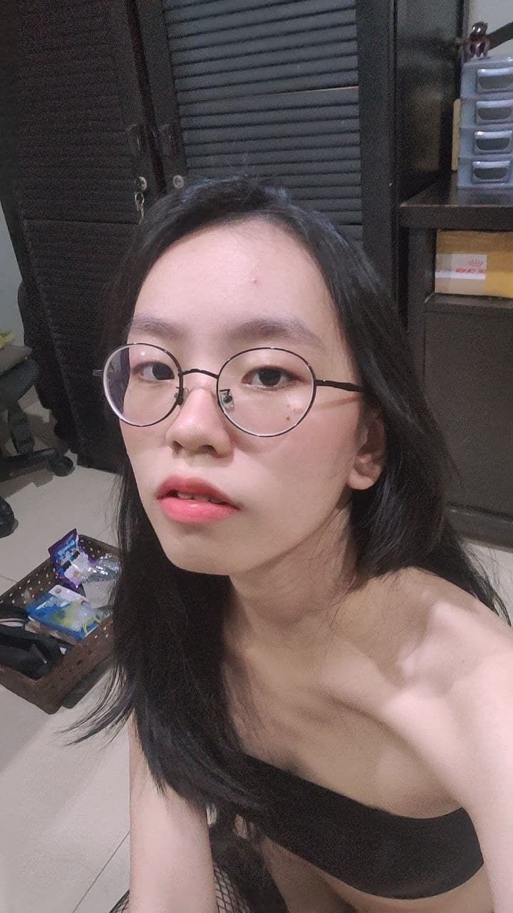 horny asian slut in black strips and masturbates