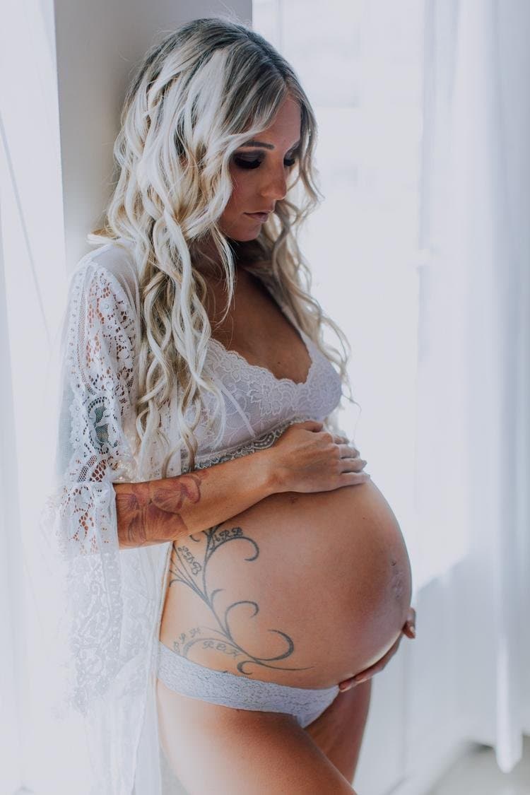 Click to view full size Intensely gorgeous blonde tatted milf to be boudoir