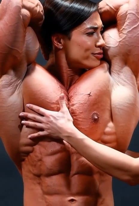 Wild lesbian orgy around her naked roided muscles