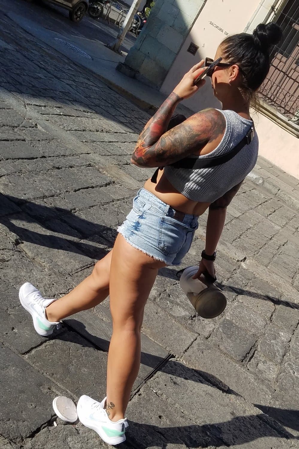 Nice legs and a little peach showing, shorts