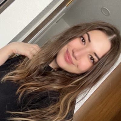 Click to view full size Hottest Milf ever? This curvy slut who loves sticking her tongue out comes damn close