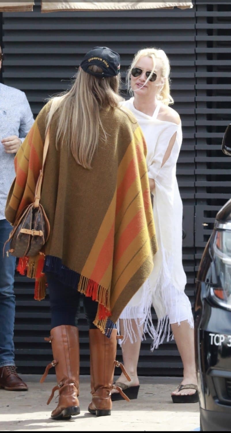 Nicollette Sheridan in platform flip flops