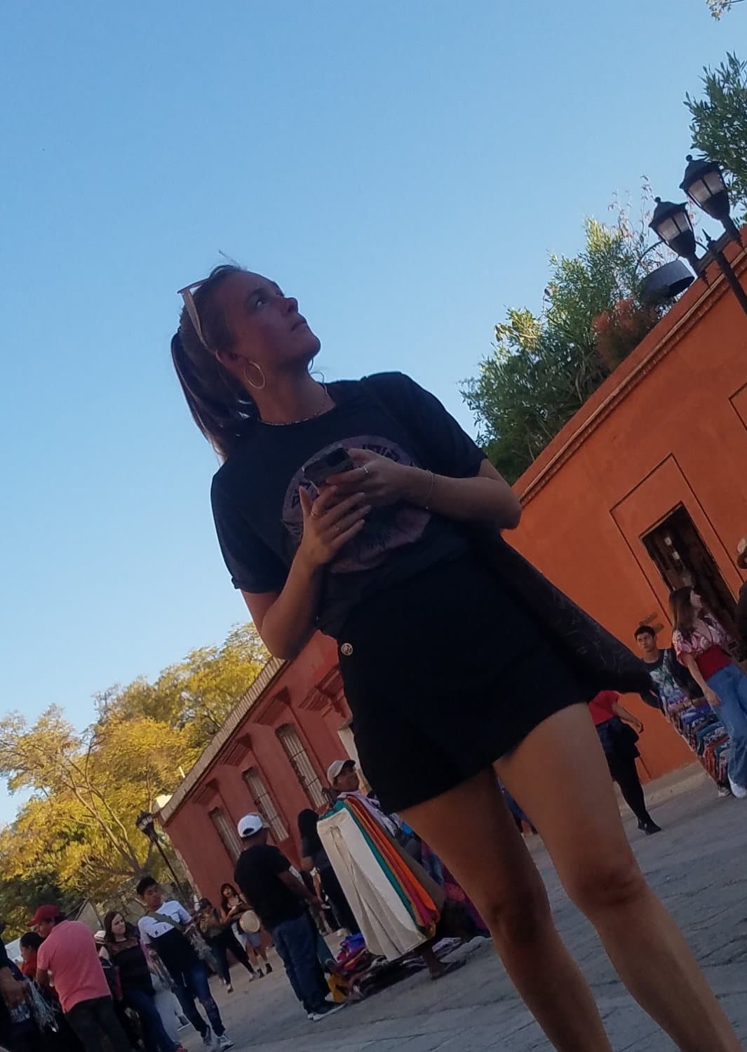 2 friends, blonde and brunette, in shorts, nice legs