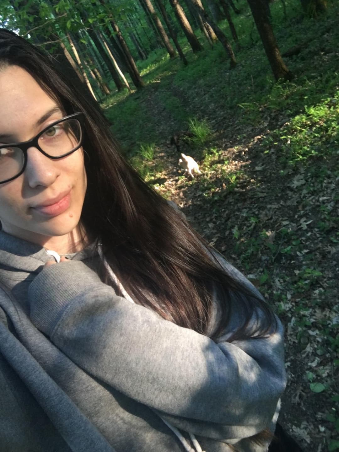 walking to the park this morning to go sunbathing . taking a short cut through the forest