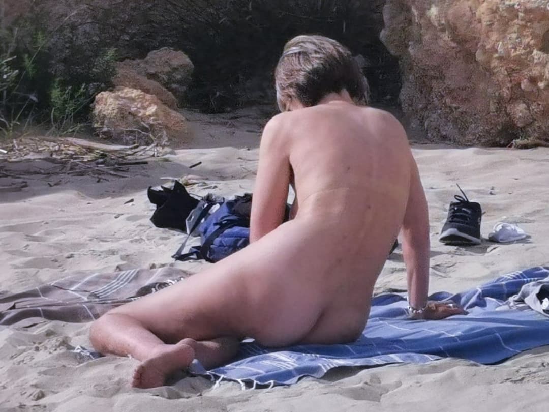 mature caught naked on the beach...