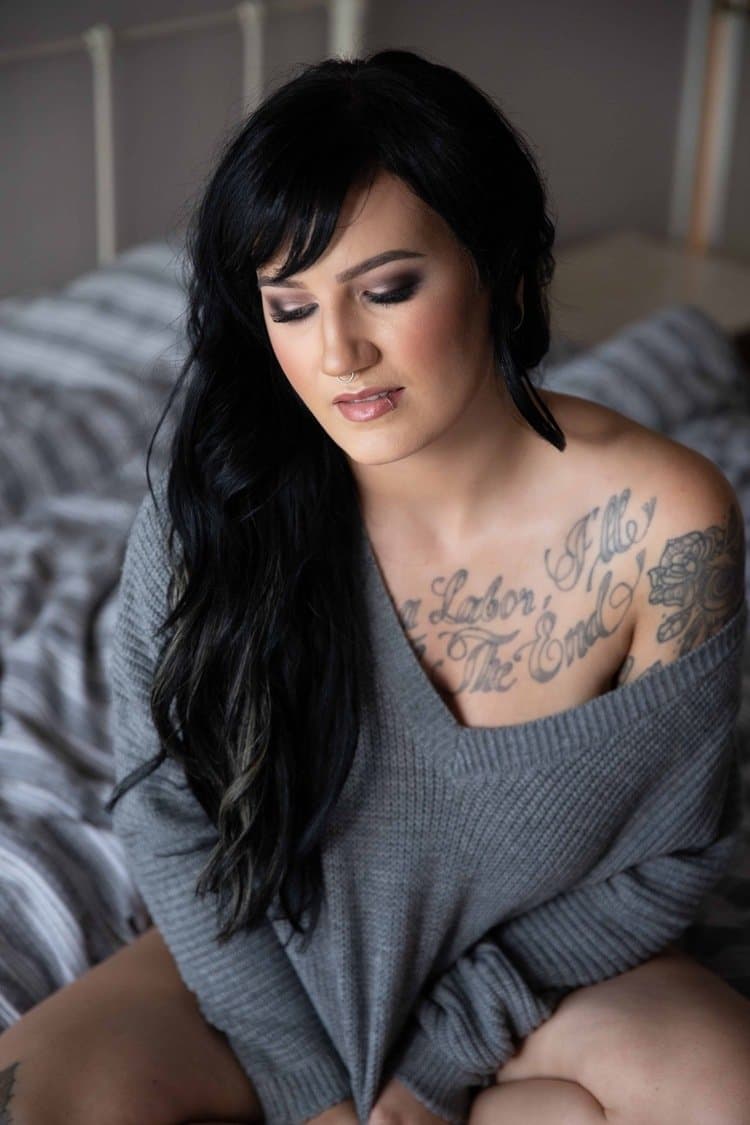 Tatted busty black hair beauty boudoir