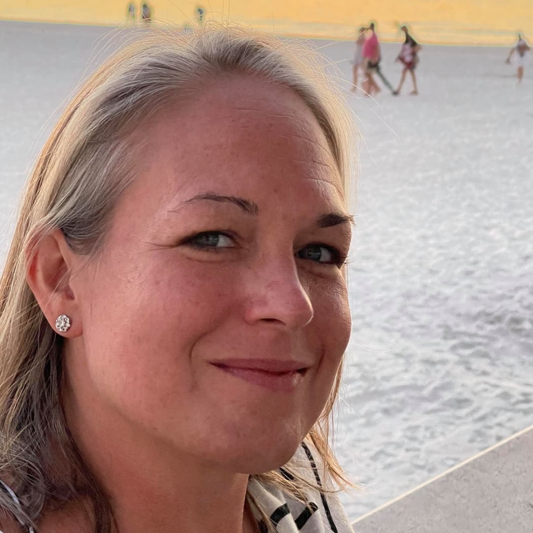 Christie gives the camera person a smirky look when she showed him her tits at mardi gras