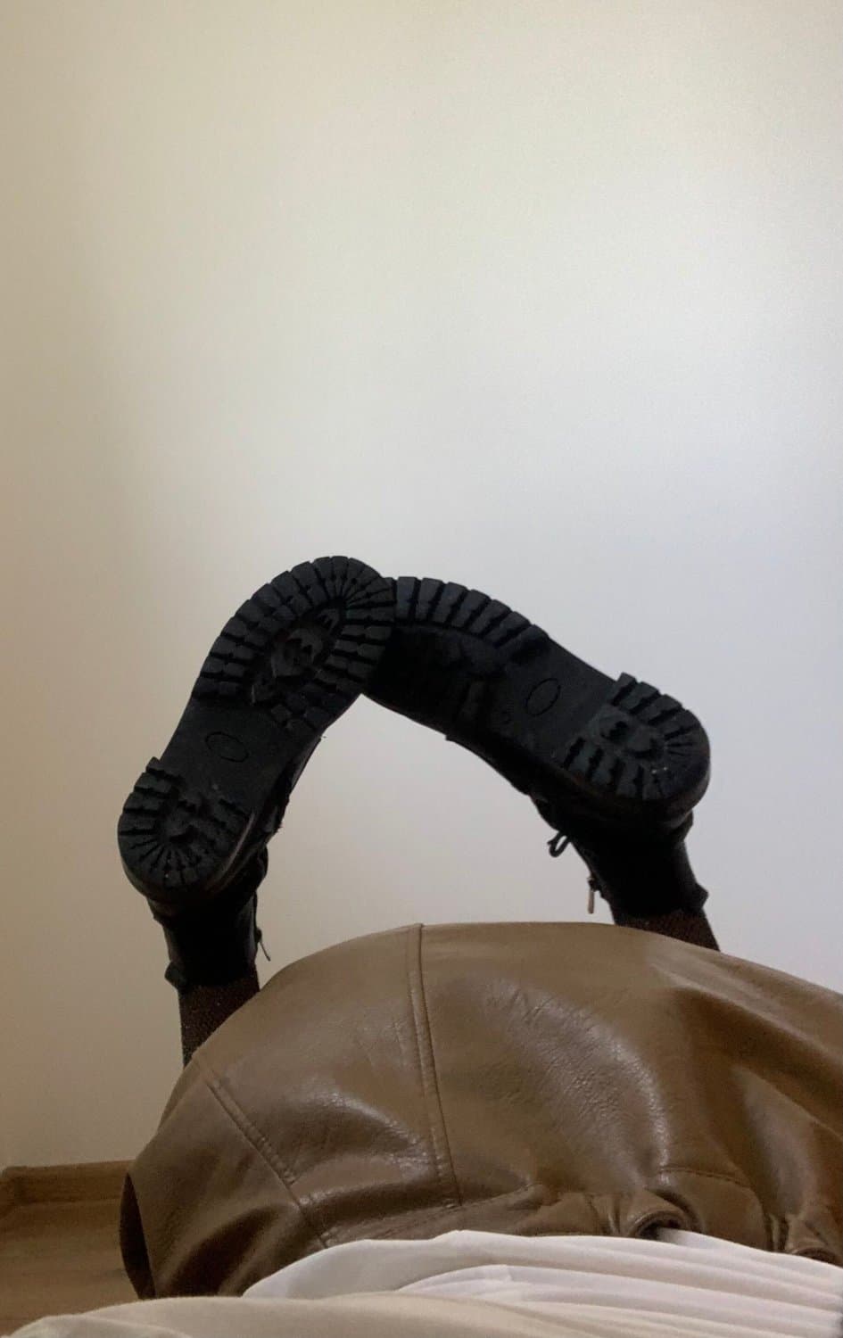 Kate Sissy Cl1412 showing her in leather skirt and fishnets