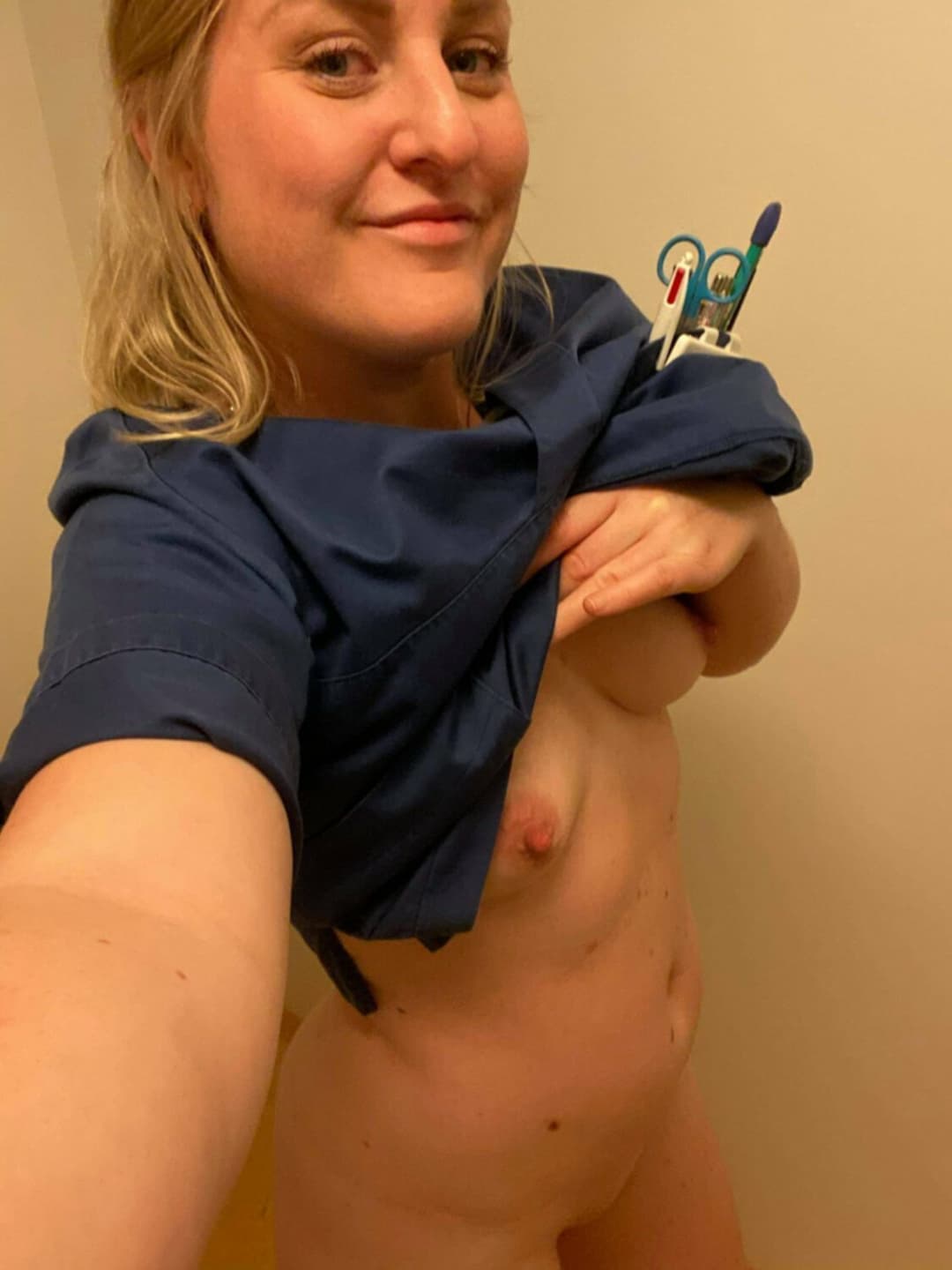 Naughty nurse shows us her hot body