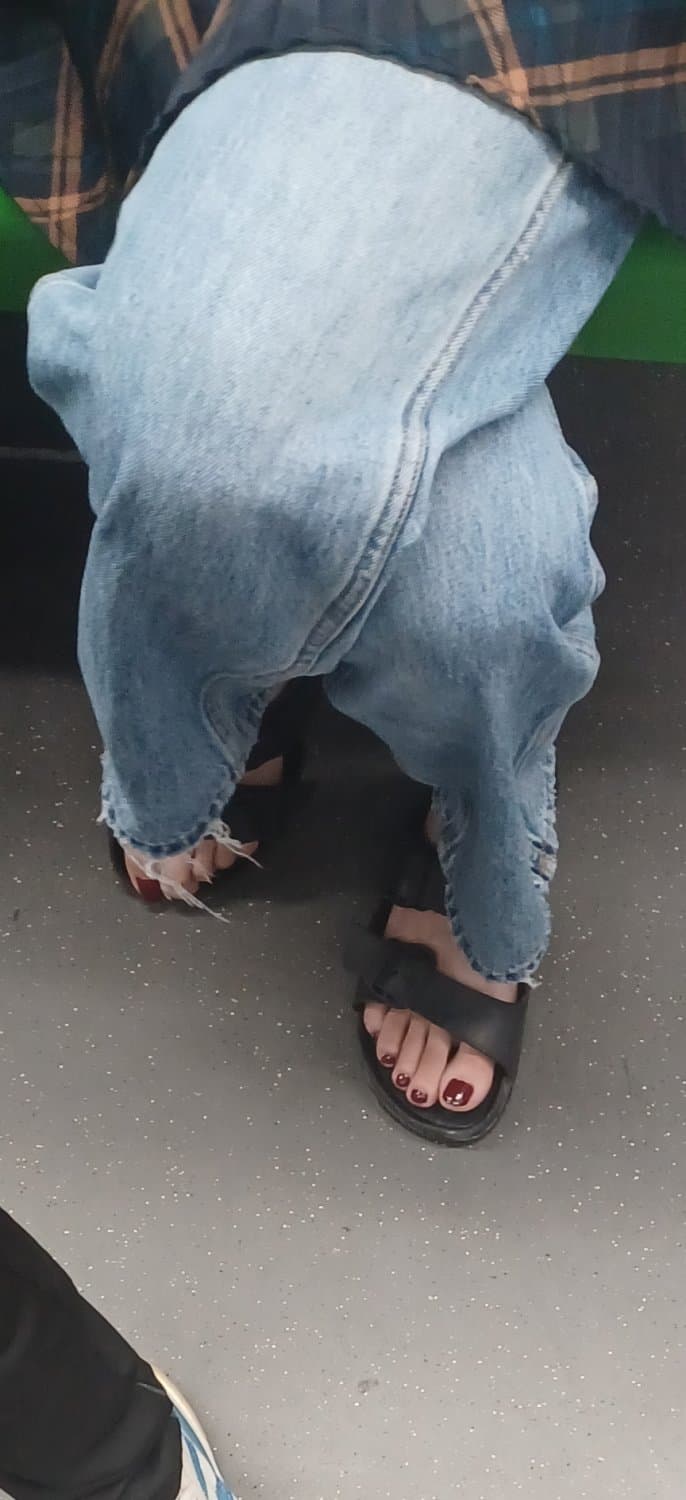 Beautiful sexy feet with red nails