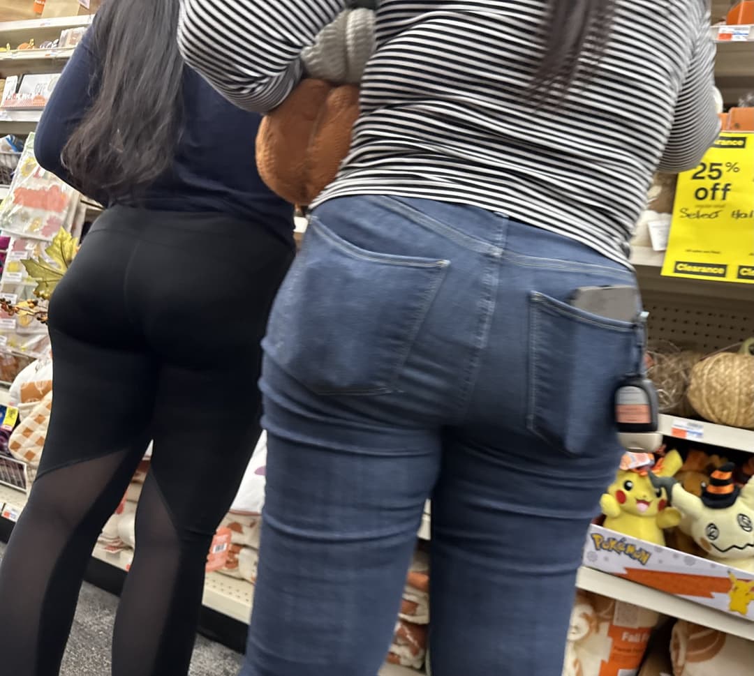 Mother in blue jeans  & Daughter in black tights.