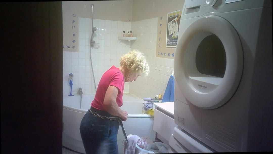 Two hidden cams for nurse Solange braless