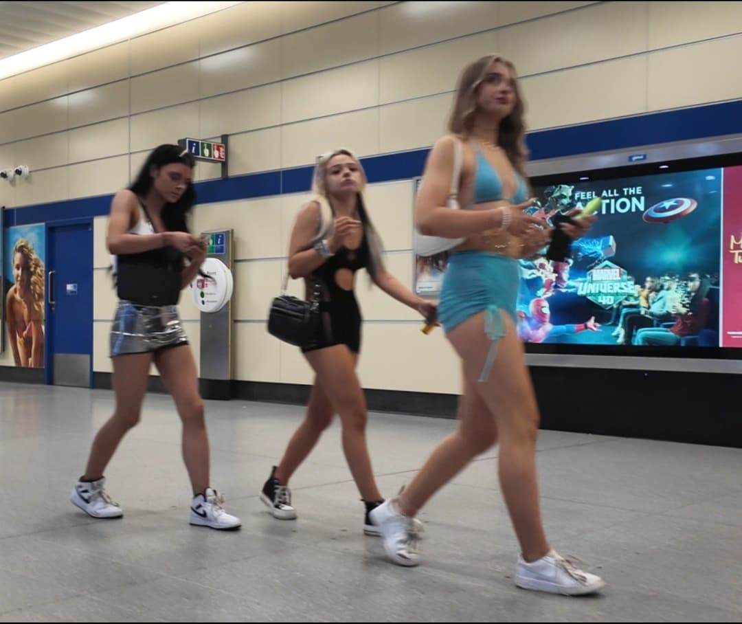 Blonde chick in short skirt ...riding up