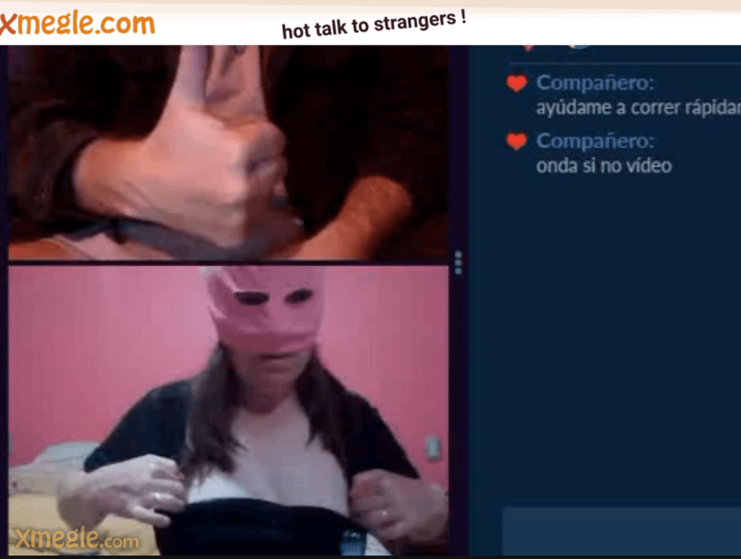 A girl, at the request of a guy, puts panties on her head