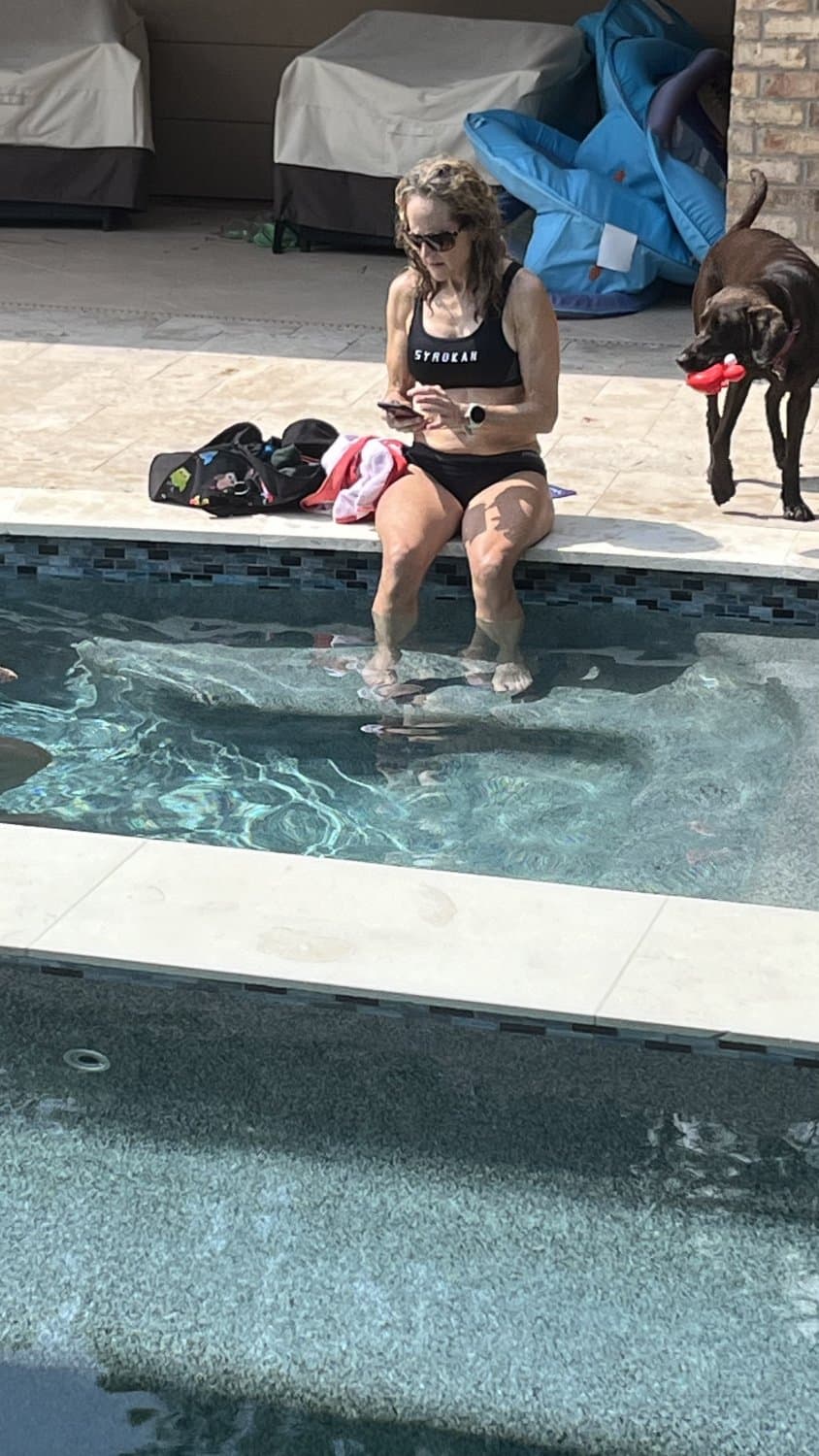 Wife’s hot little friend/GILF takes a dip in the pool after some cycling