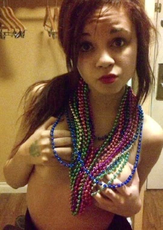 I think she wore the bikini w the ring so guys can shove their cock through when they tittyfuck her