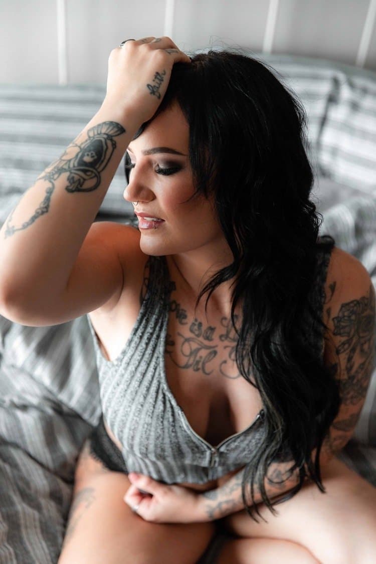 Tatted busty black hair beauty boudoir