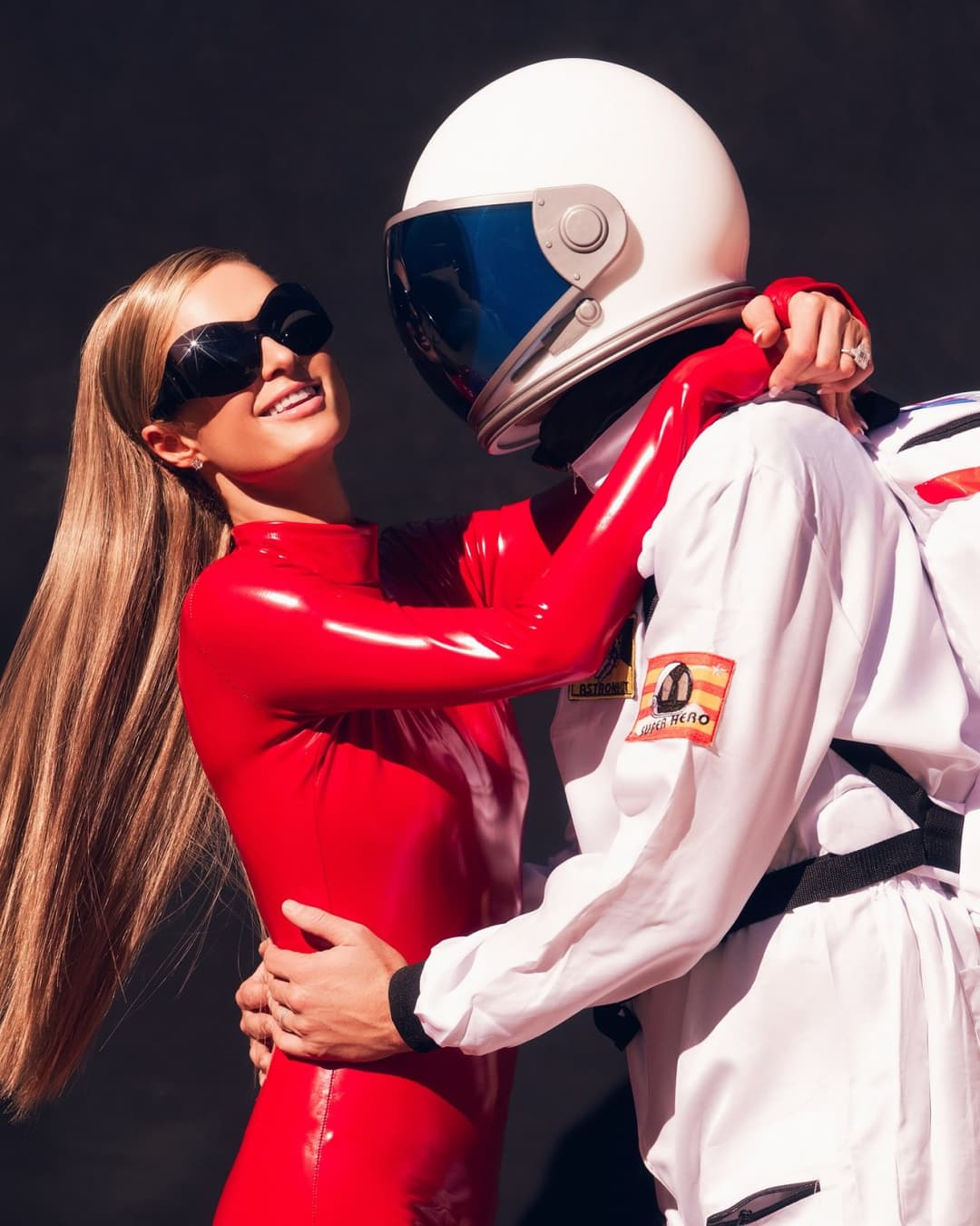 Paris in PVC catsuit