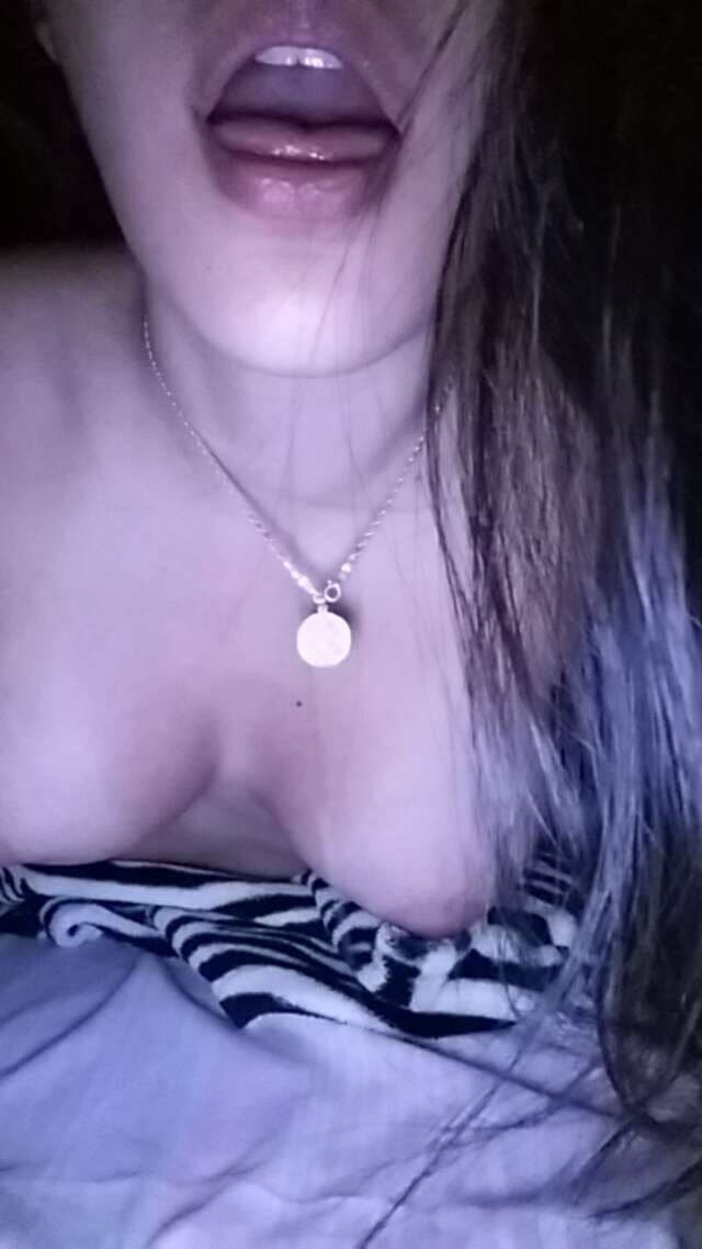 Brunette slut fake tits pretty smile