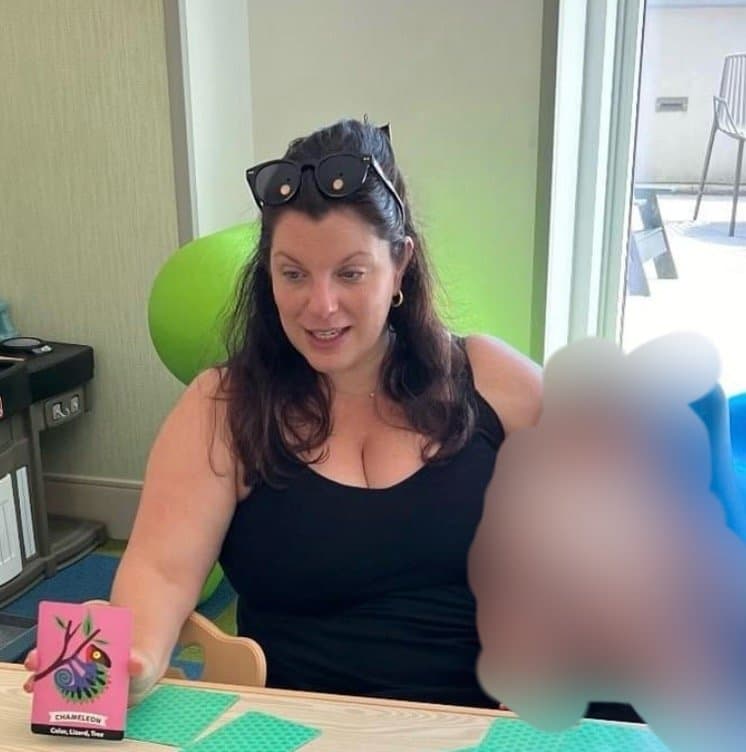 Busty lesbian lets horny boys play with her big titties on camera at mardi gras