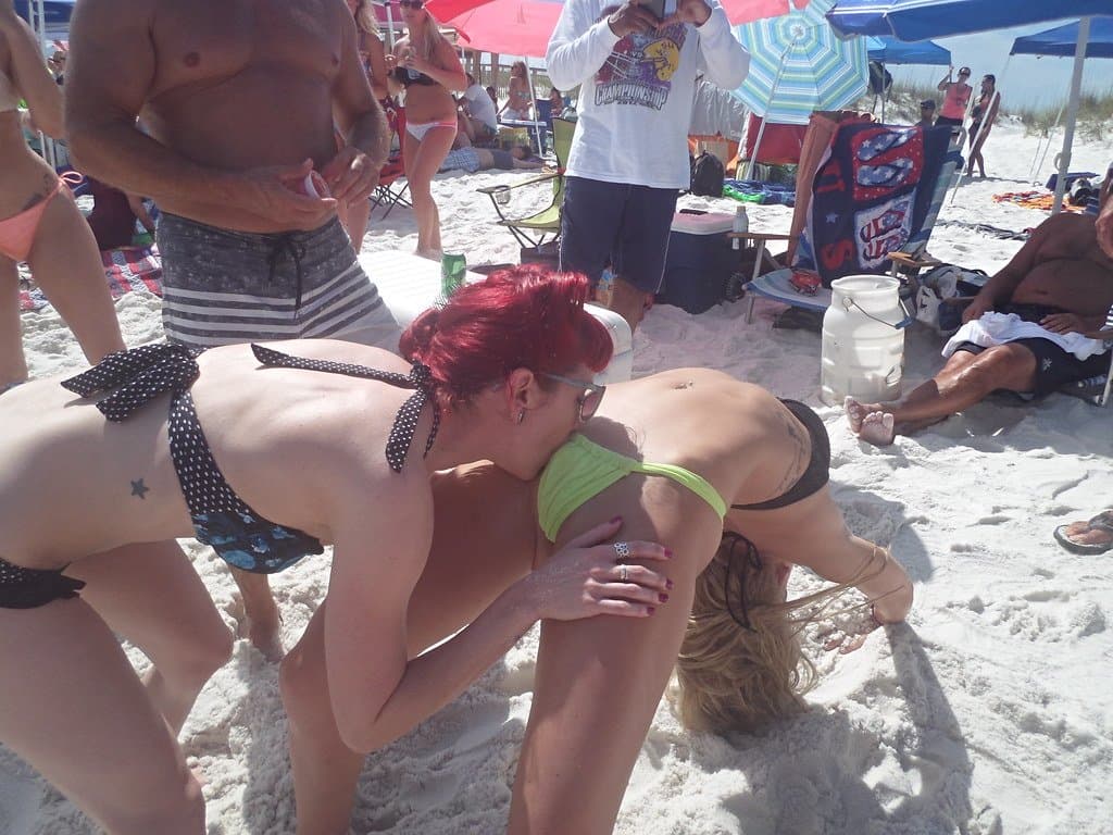 Beach sluts lick each other