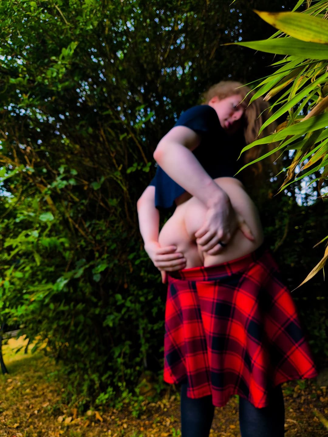 Femboy chills in Garden :3