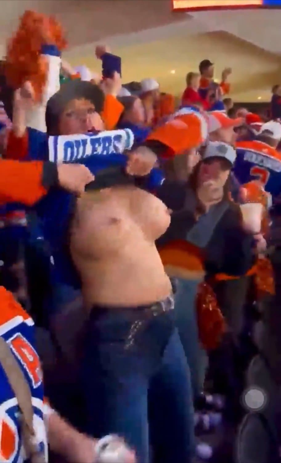 Mama flashing at a game