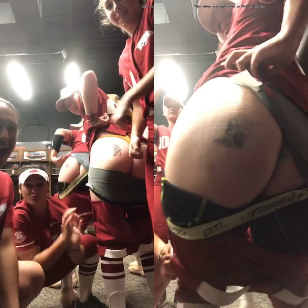 Young baseball team girls moon in locker room