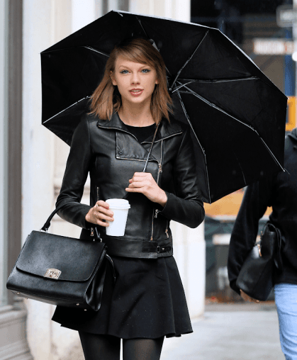 Taylor Swift tight black leather jacket outfit