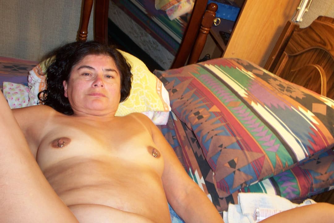 Marilyn enjoys being totally nude for you to see her body.