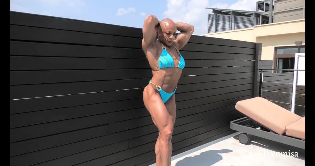 Mrs Menage, just smelling her own roided muscles gives her a powerful orgasm