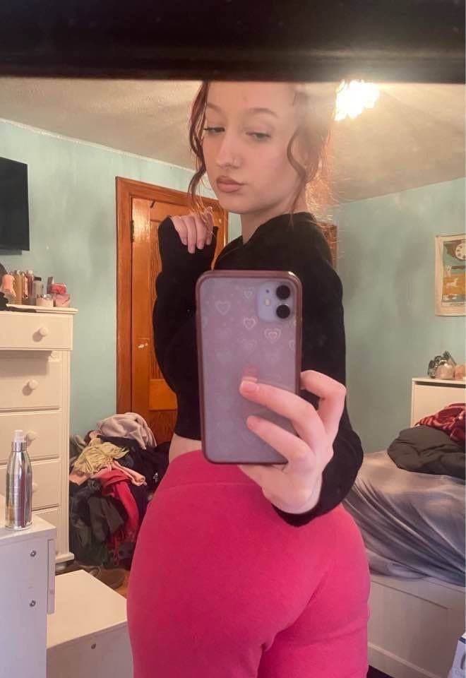 Slutty red head loves showing off her perfect ass