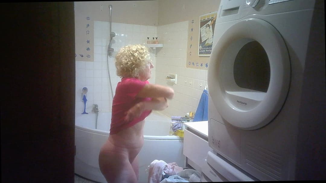 Two hidden cams for nurse Solange braless